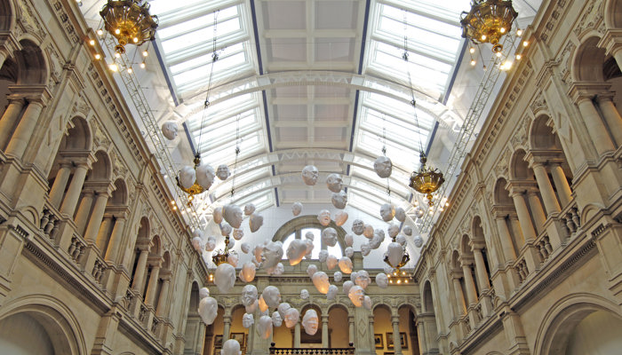 Floating heads at Kelvingrove Art Gallery and Museum - each head has a different expression.