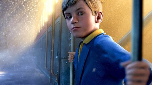 Movie still showing a young boy leaning out of a train in front of a snowy backdrop