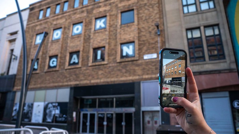 LOOK AGAIN artwork in the window's of the Old M&S building on Sauchiehall Street ‘24 Things to Tell You’ by Craig McCorquodale and Molly Jack, photo by Brian Hartley