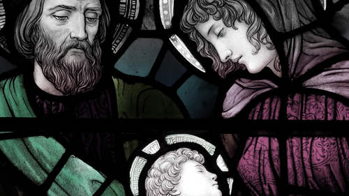 Stained glass showing three figures